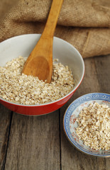 Close up of dry oatmeal in two dishes