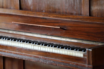 Fototapeta na wymiar Very old vintage piano keyboard