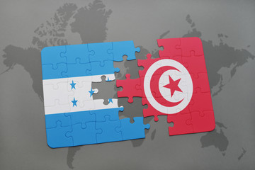 puzzle with the national flag of honduras and tunisia on a world map