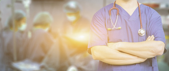 Medical ,Doctor surgeon posing with arms crossed in an operating theatre,surgical room,doctor with operating room,healthcare and medical concept,stethoscope,medical,healtcare ,background banner