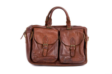 Оld brown leather bag on white background