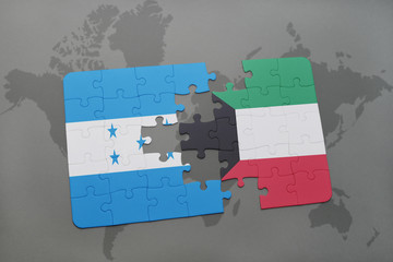 puzzle with the national flag of honduras and kuwait on a world map
