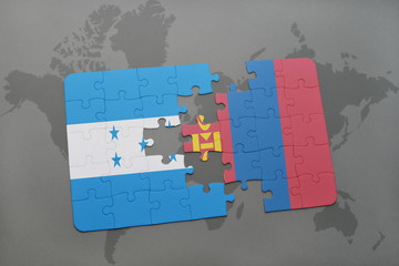 puzzle with the national flag of honduras and mongolia on a world map