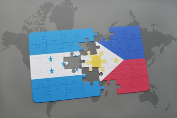 puzzle with the national flag of honduras and philippines on a world map