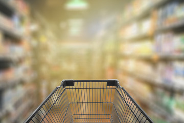 Abstract blurred photo of store with trolley in department store bokeh background,Shopping cart in supermarket and Home Hardware and furniture Stores