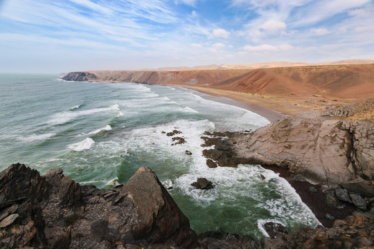 Rough colorful coastline, Atlantic, Morocco