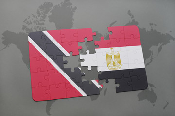 puzzle with the national flag of trinidad and tobago and egypt on a world map