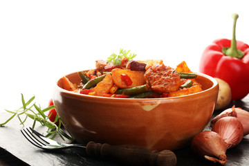 Roast meatballs, chips or roasted potatoes and vegetables