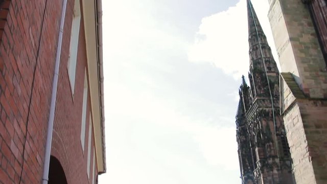 Gothic Architecture of Lichfield Cathedral contrasted opposite modern town houses