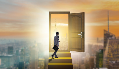 Fototapeta premium Businessman walking towards open door