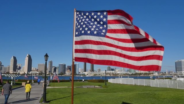SAN DIEGO, CA - Circa February, 2017 - American flags flap in the breeze at Centennial Park on Coronado Island.  	
