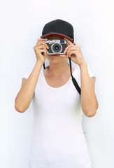 Asian women wear T-Shirt and cap was being photographed