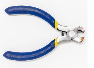 Cutting plier on white background