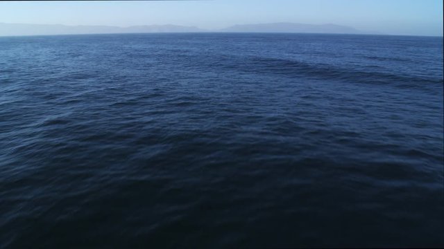 Flight over open ocean, nearing Catalina on the horizon. Shot in 2010. 
