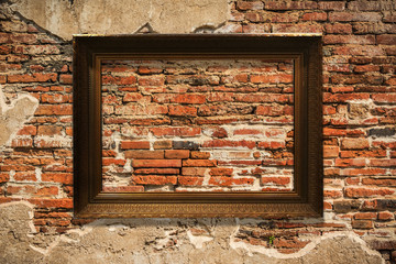 wooden picture frame on old wall background