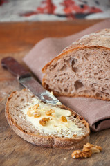 Freshly baked homemade artisan sourdough rye and white flour bread.