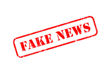 FAKE NEWS  rubber stamp over a white background