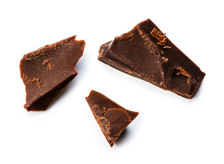 Chocolate pieces isolated on white background with clipping path. Top view.