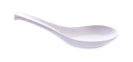 white spoon isolated on white background
