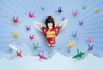 Japanese girls wearing national dress  and origami bird flying on the sky with cloud.