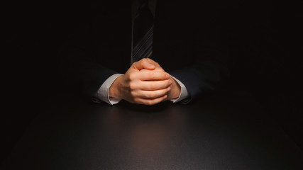 Businessman hands in a dark room - 139651351