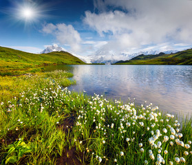 Wetterhorn and Wellhorn peaks in the morning mist on Bachsee lake