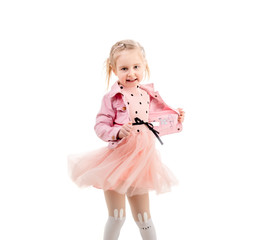 Adorable child dancing and spinning