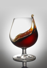 Splash in glass of cognac