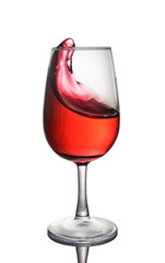 Splash of a red wine in glass