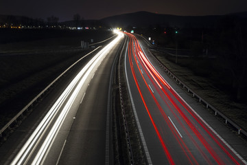 Fototapeta na wymiar Highway by night with car lights trails, Slovakia