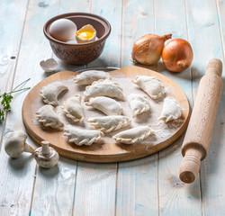 vareniks in the process of being cooked