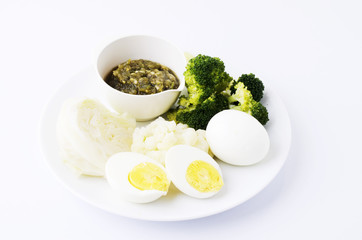 Thai sauce with boiled vegetables and eggs for Thai foods concept