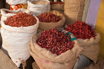 Bags of dried red chili on a market in India