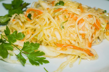 Chopped sauerkraut with carrot and parsley