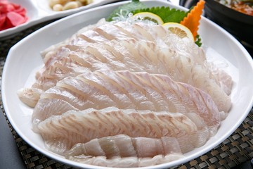 sliced raw flatfish