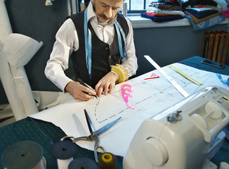 Clothes designer in the studio