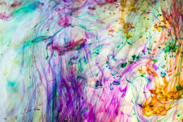 Acrylic colors and ink in water. Abstract background.