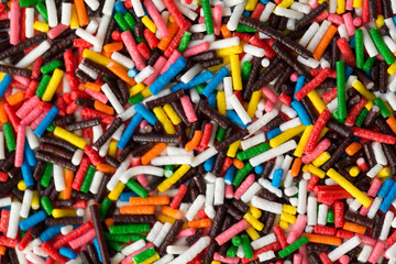 Sugar sprinkle dots, decoration for cake and bekery, a lot of sprinkles as a background