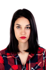Serious brunette girl with red plaid shirt