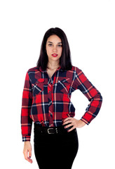 Young brunette woman with plaid shirt and black jeans