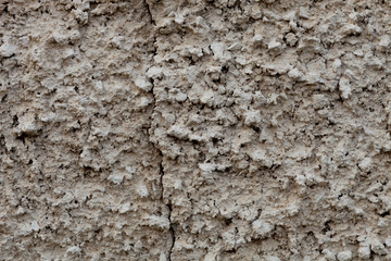 Grey texture of clay in a wall