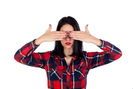 Brunette woman covering her eyes with a red plaid shirt