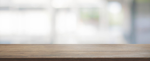 Wood table top and blurred bokeh background - can used for display or montage your products.