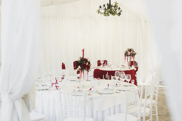 Beautiful Banquet hall under a tent for a wedding reception.