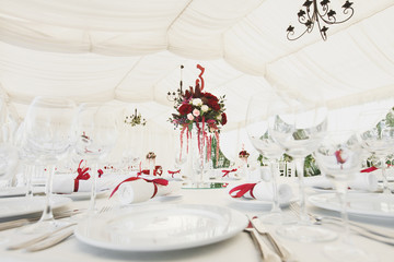Beautiful Banquet hall under a tent for a wedding reception.