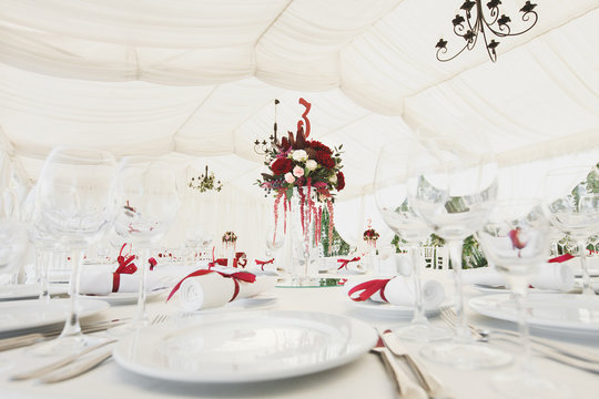 Beautiful Banquet hall under a tent for a wedding reception.