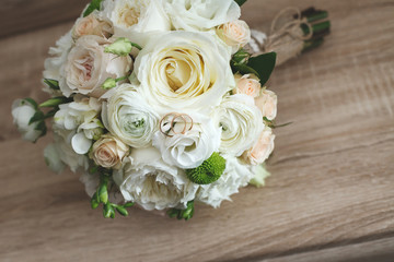 Beautiful wedding colorful bouquet for bride. Beauty of colored flowers. Close-up bunch of florets. Bridal accessories. Female decoration for girl. Details for marriage and for married couple