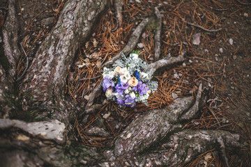 Beautiful wedding colorful bouquet for bride. Beauty of colored flowers. Close-up bunch of florets. Bridal accessories. Female decoration for girl. Details for marriage and for married couple