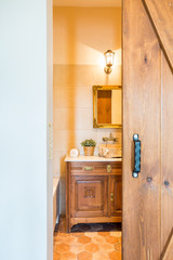 Bathroom behind the open door
