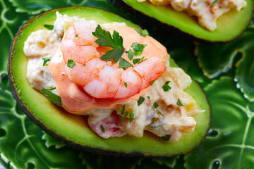 Seafood filled avocado with shrimps tapas pinchos